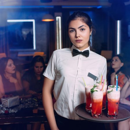 Waitress with drinks on a tray